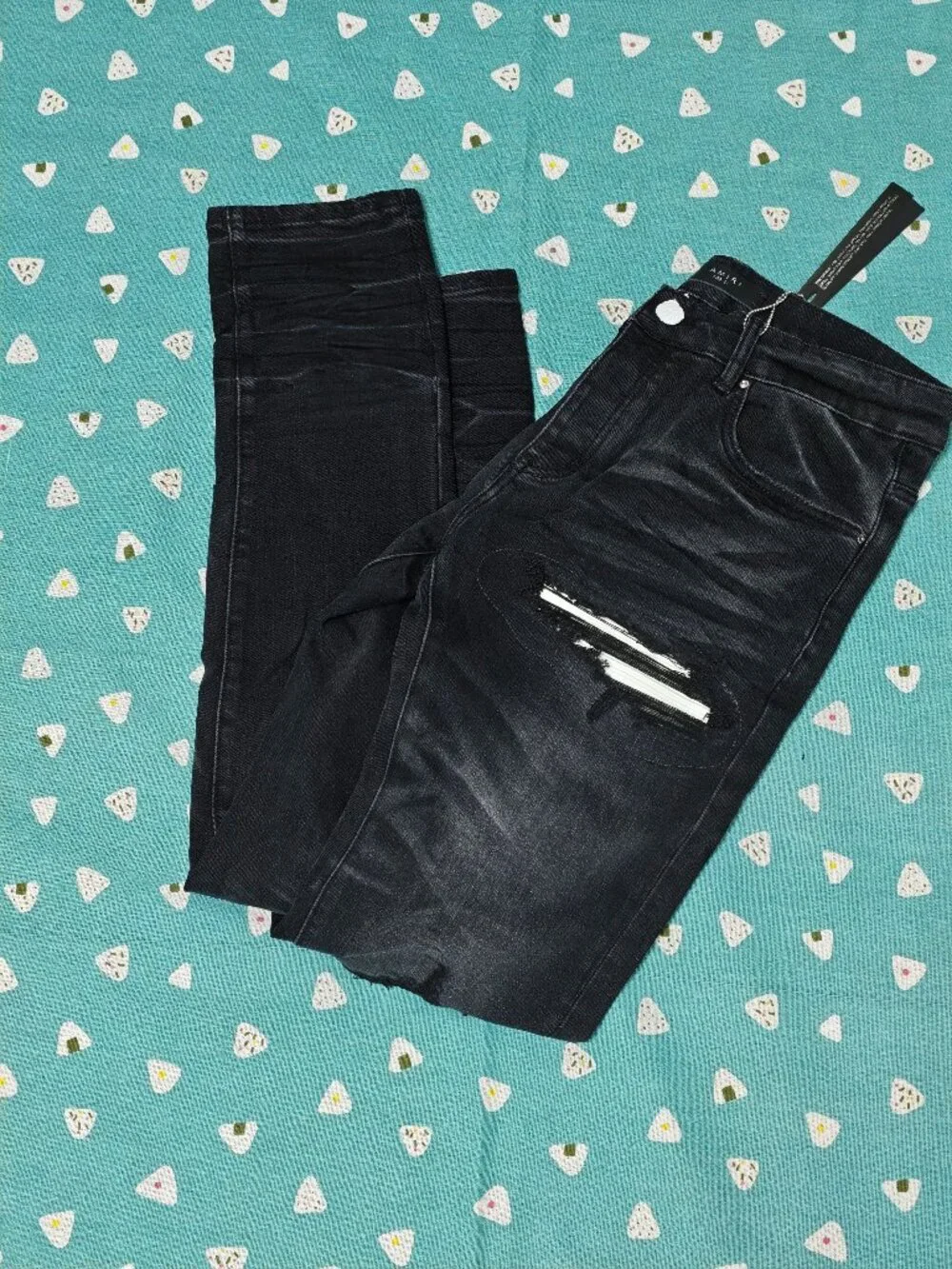 AMIRI Black Distressed Skinny Jeans with Knee Rips